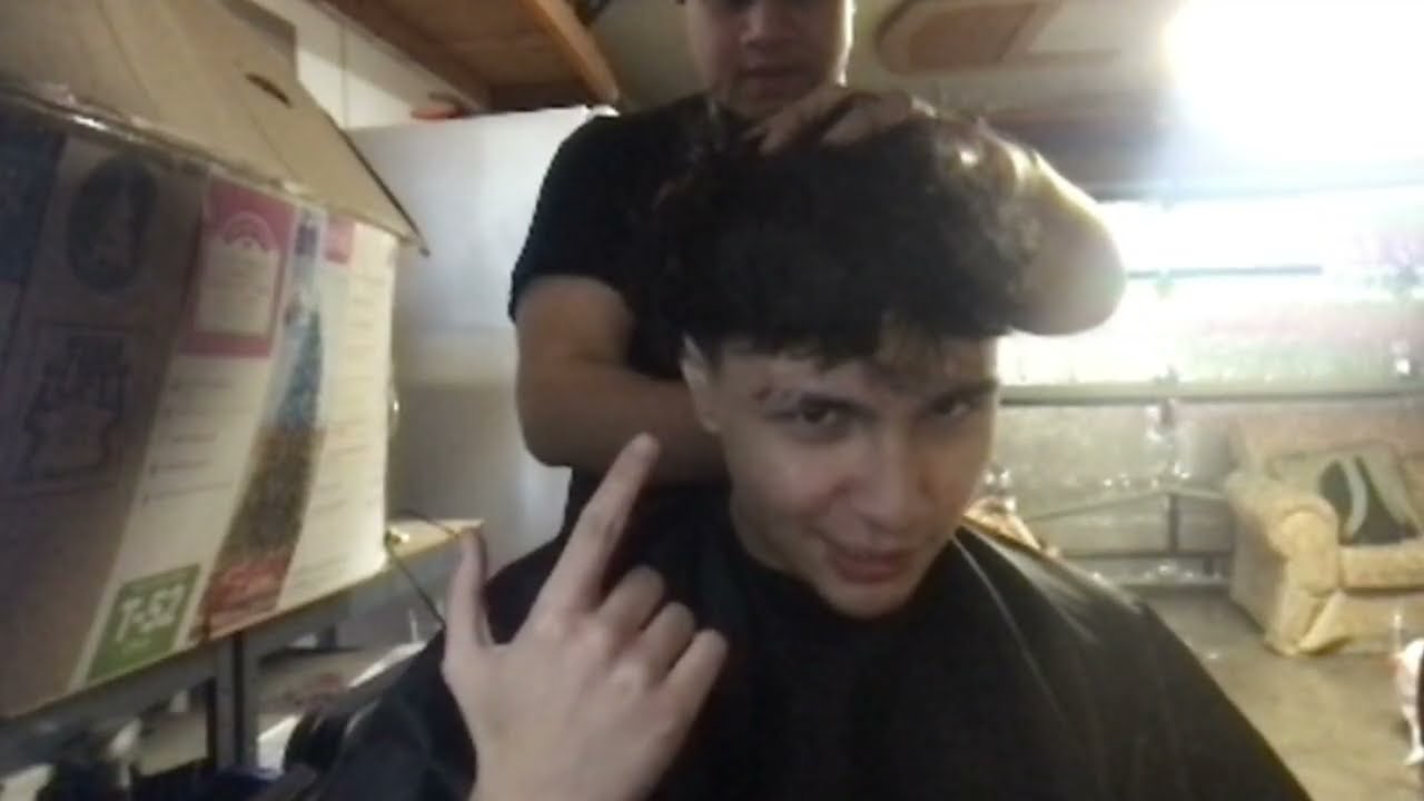 making a beat while getting a haircut
