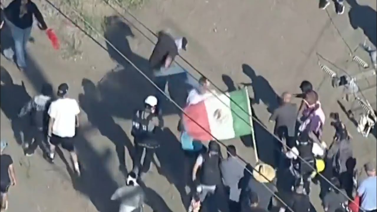 WATCH: Protesters attack ICE agents conducting raid on California farm