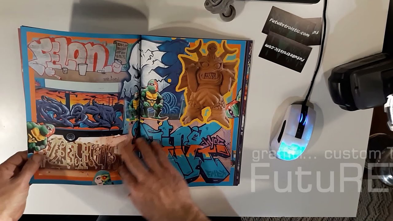 FutuRETROistic Mag Zine page turning issue 3 featuring Graffiti, Custom Toys and 8-bit Video Games