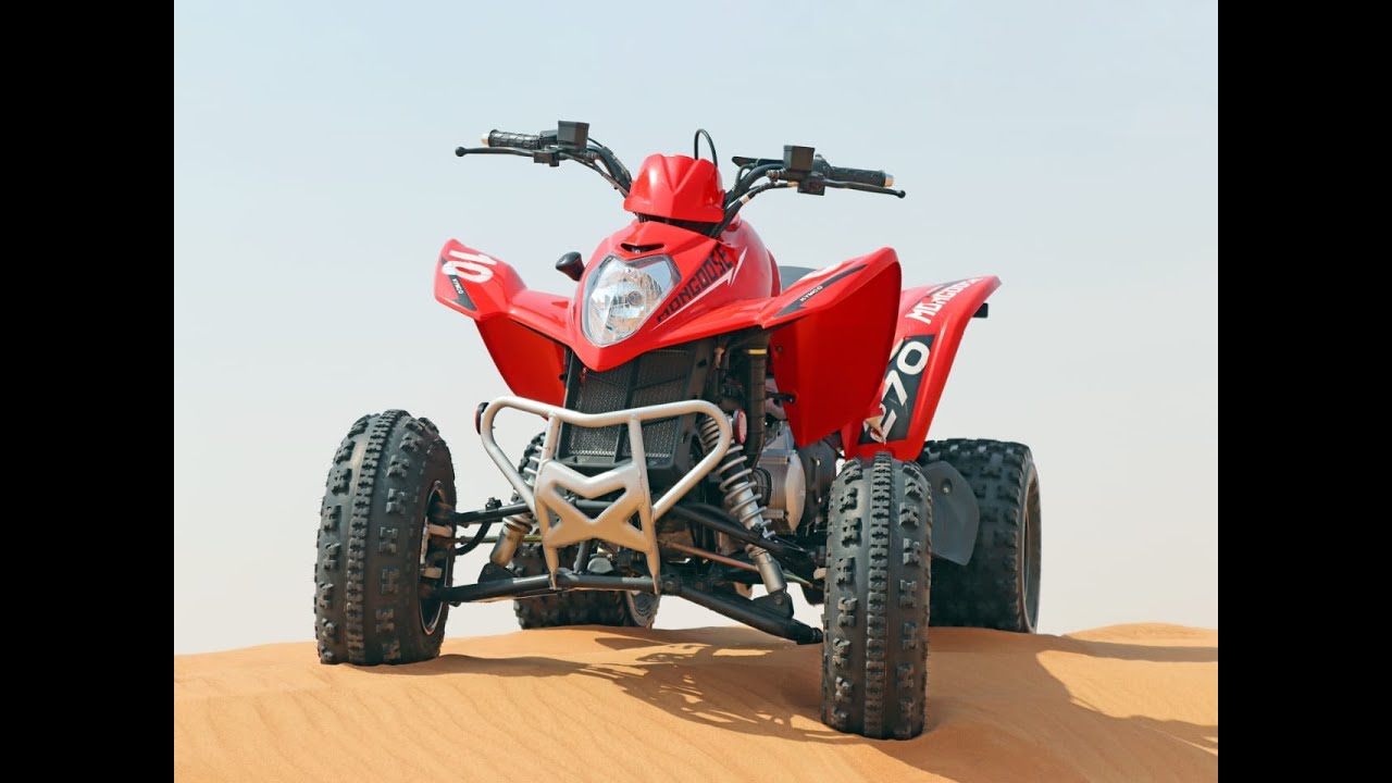 First-Time Quad Bike Riders in the Desert, Kuwait