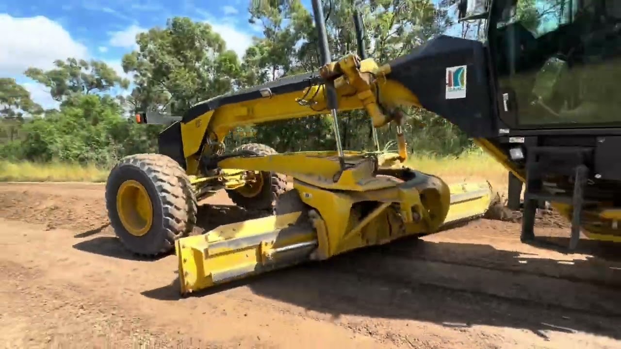 Heavy Grading. Using the 14ft blade enables spreading in two movements across road.