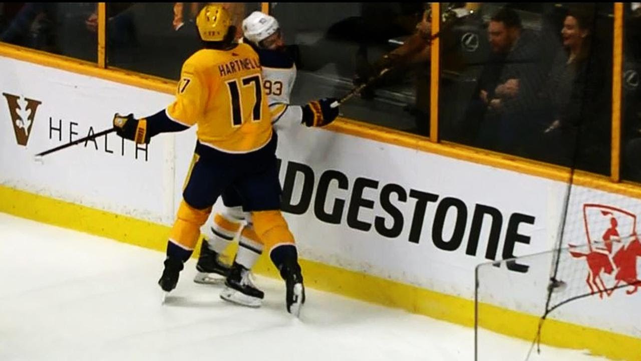 Antipin stretchered off after hit from Hartnell into the boards