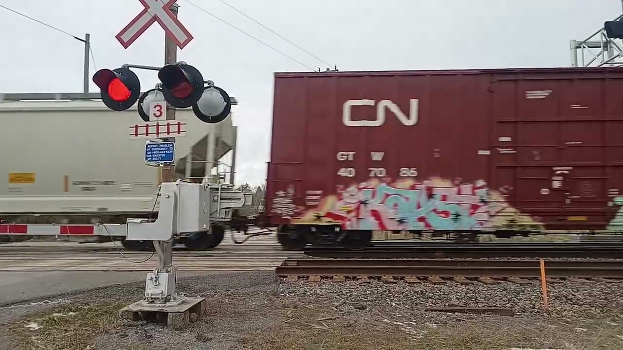 C44-9W and SD70M-2 on a mixed freight passing mp 202.77 with beautiful horn 