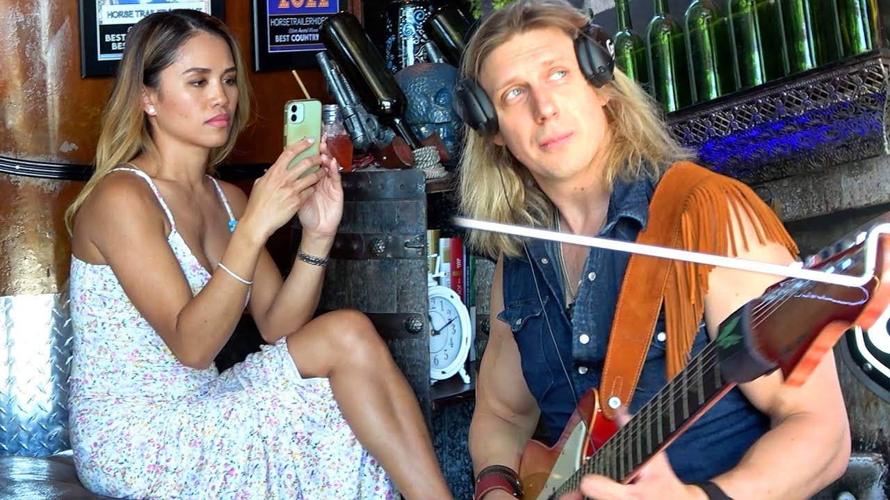She Requests Bob Marley and Starts to Film