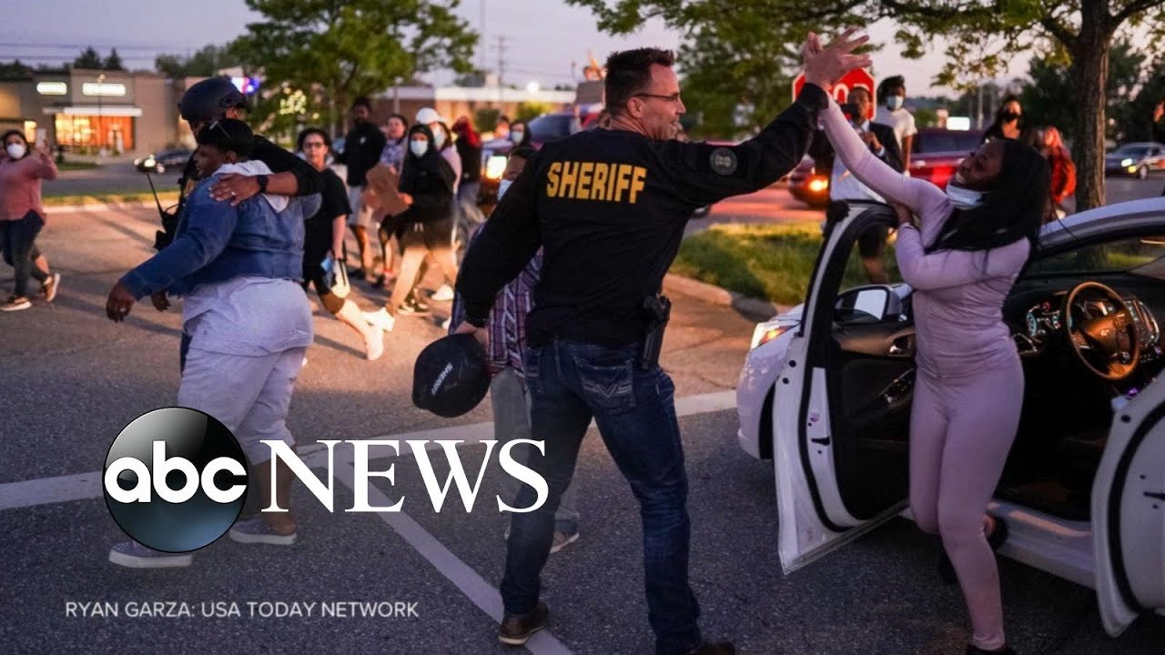 Powerful displays of support between officers and community | WNT