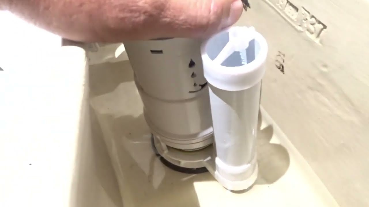 como instalar una válvula de descarga duo y ajuste de rebosadero en un WC de una sola pieza