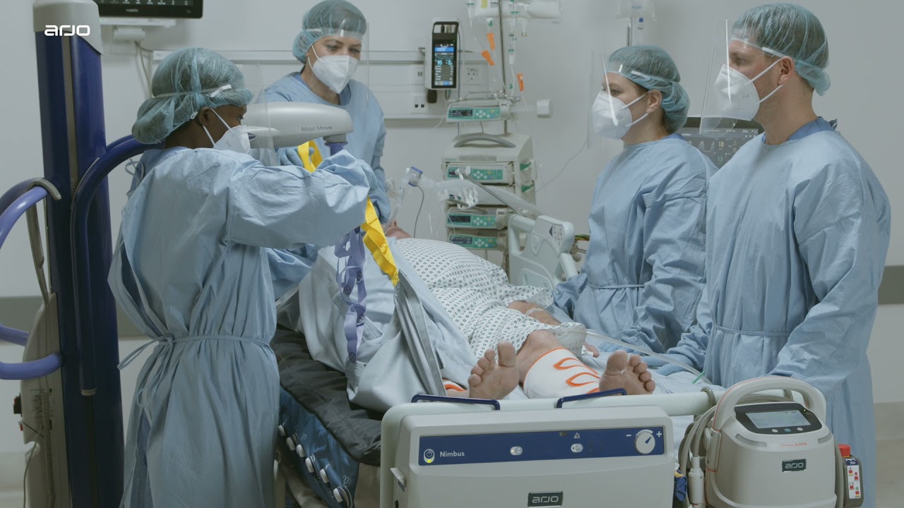 Turning a patient from supine to the prone position - Passive floor lift