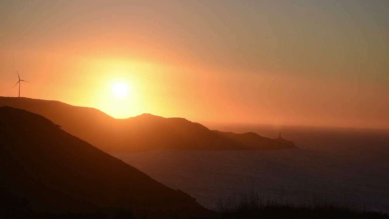 Puesta de sol sobre el Cabo Nariga vista desde el Cabo Santo Adrián