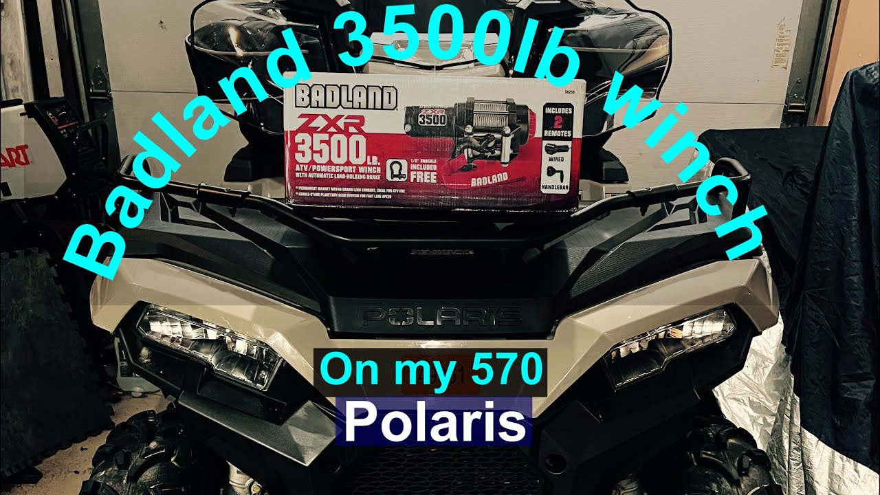 На квадроцикл Polaris Sportsman 570 22 дюйма установлена ​​лебёдка Badland ZXR грузоподъемностью ...
