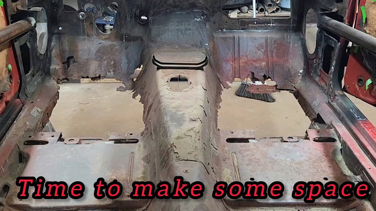 Removing the floor pan....whats left of it