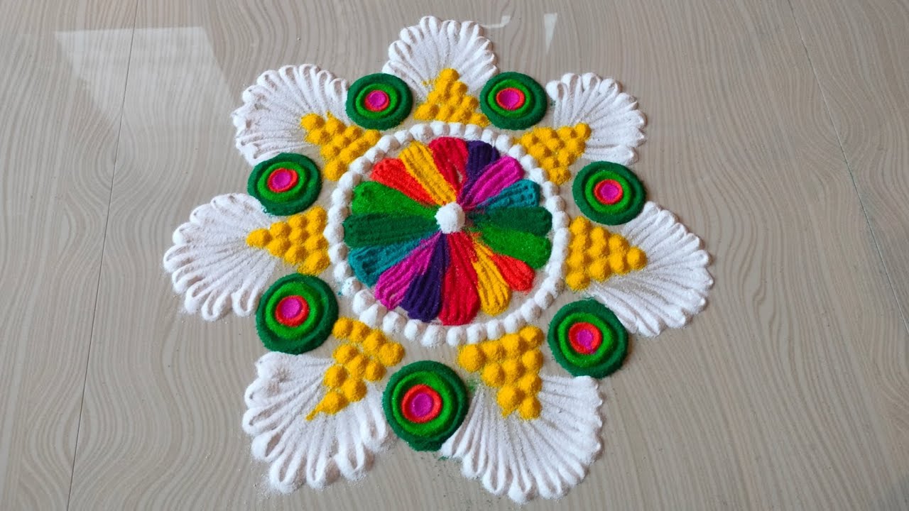 Colourful and elegant rangoli 🤩. #youtubevideo #easyrangoli #rangolidesigns 