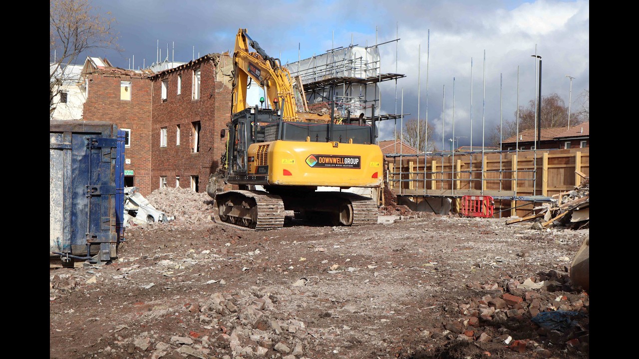 30 ton digger Demolition a building in Sutton South london