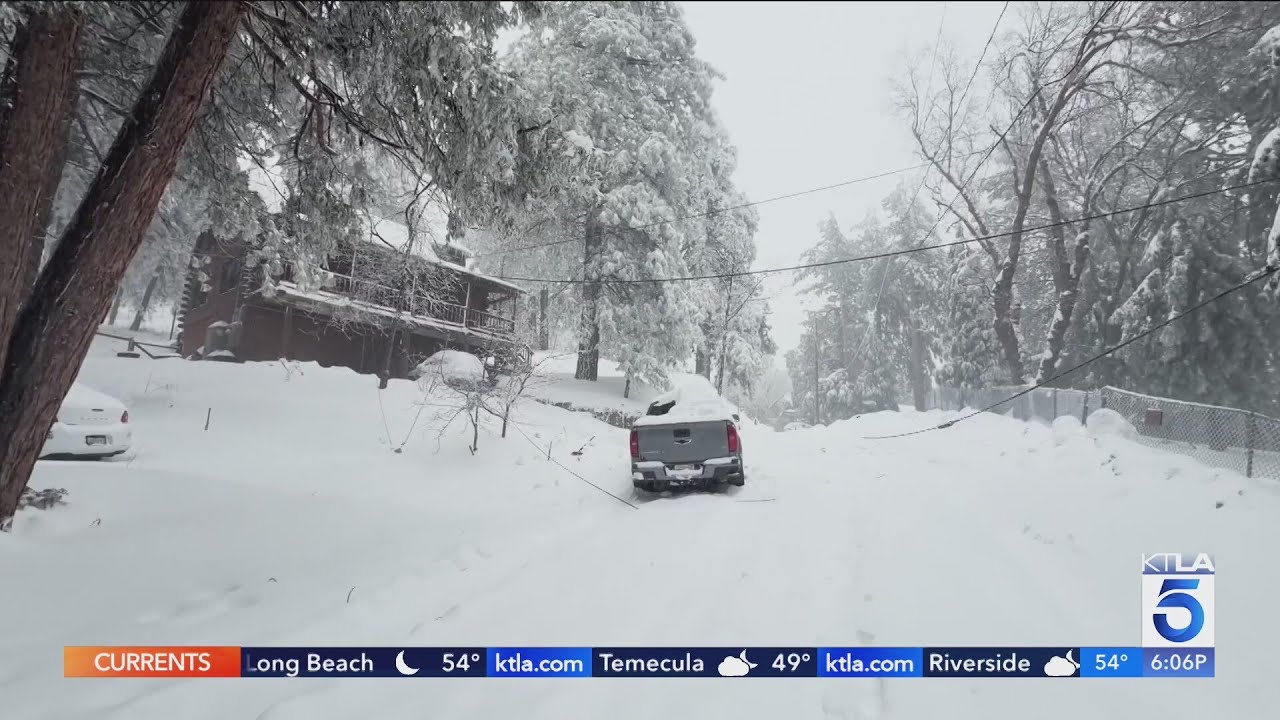 Snow blankets SoCal mountain communities, power knocked out
