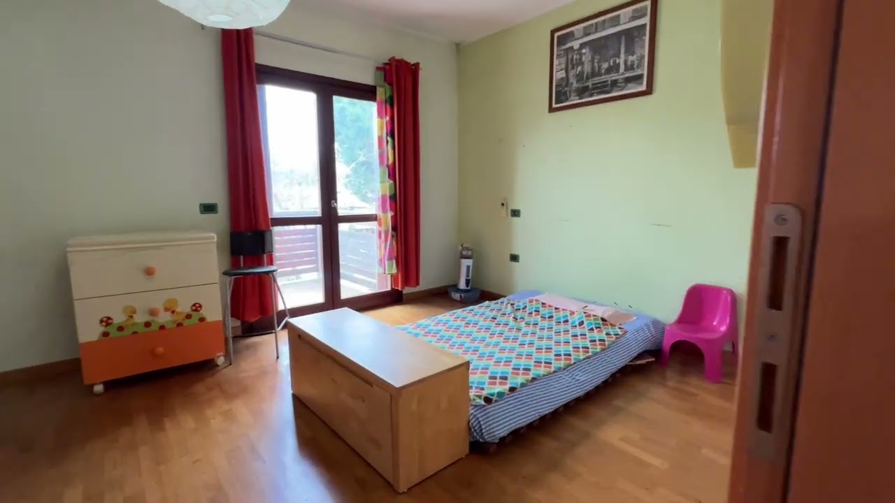 APPARTAMENTO TRILOCALE CON MANSARDA E GARAGE DOPPIO