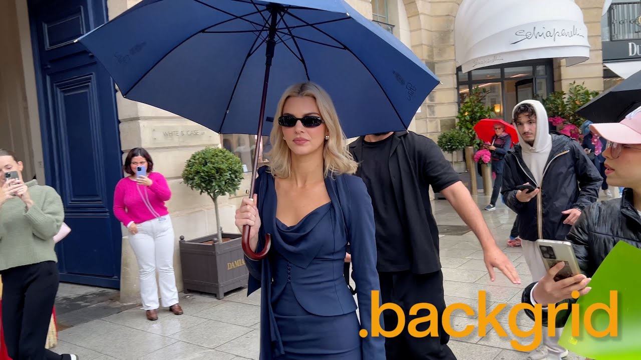 Kendall Jenner gets caught in the rain in Paris during a Schiaparelli fitting at PFW
