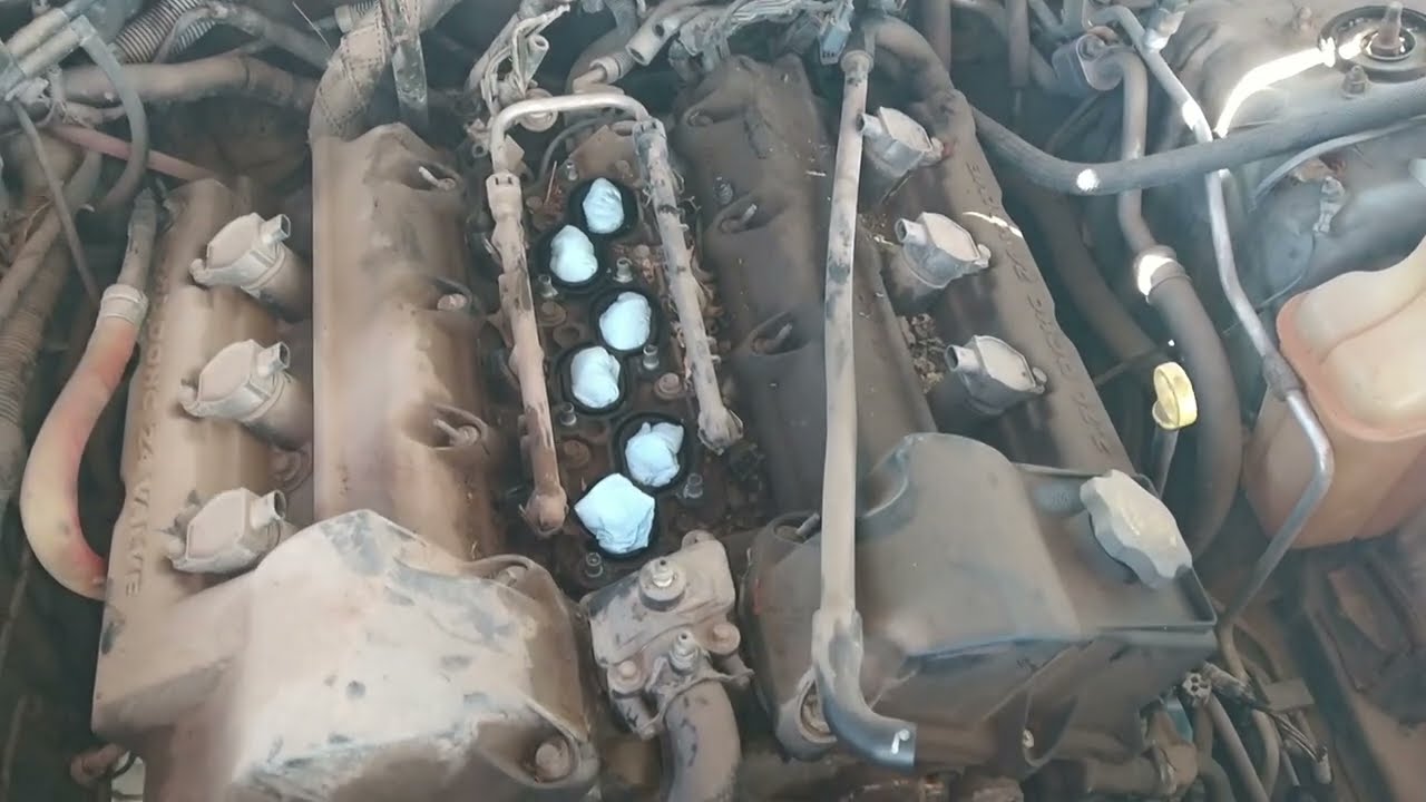 Falla tensor de cadena de tiempo Dodge Charger 2.7l v6. cambio de bomba de agua, tope tensor.