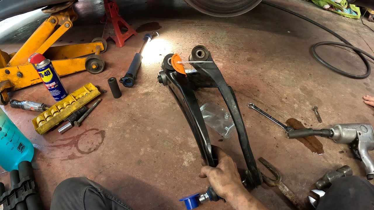 Repairing a very bent control arm after hitting a curb