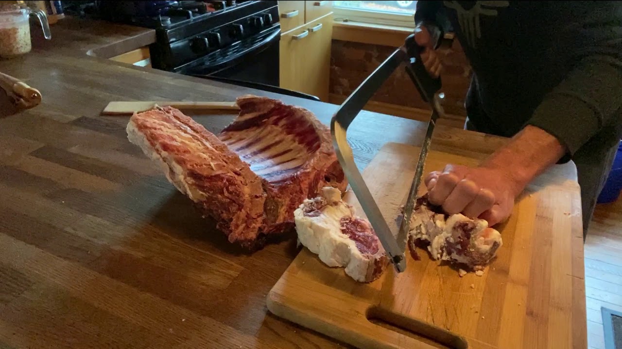 Cutting Lamb Ribs With the Bone Saw