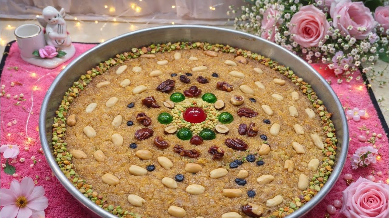 صينية حلوى معمولة بحب… والتاريخ شاهد لما المكسرات تتجمّع، الجمال يطلع