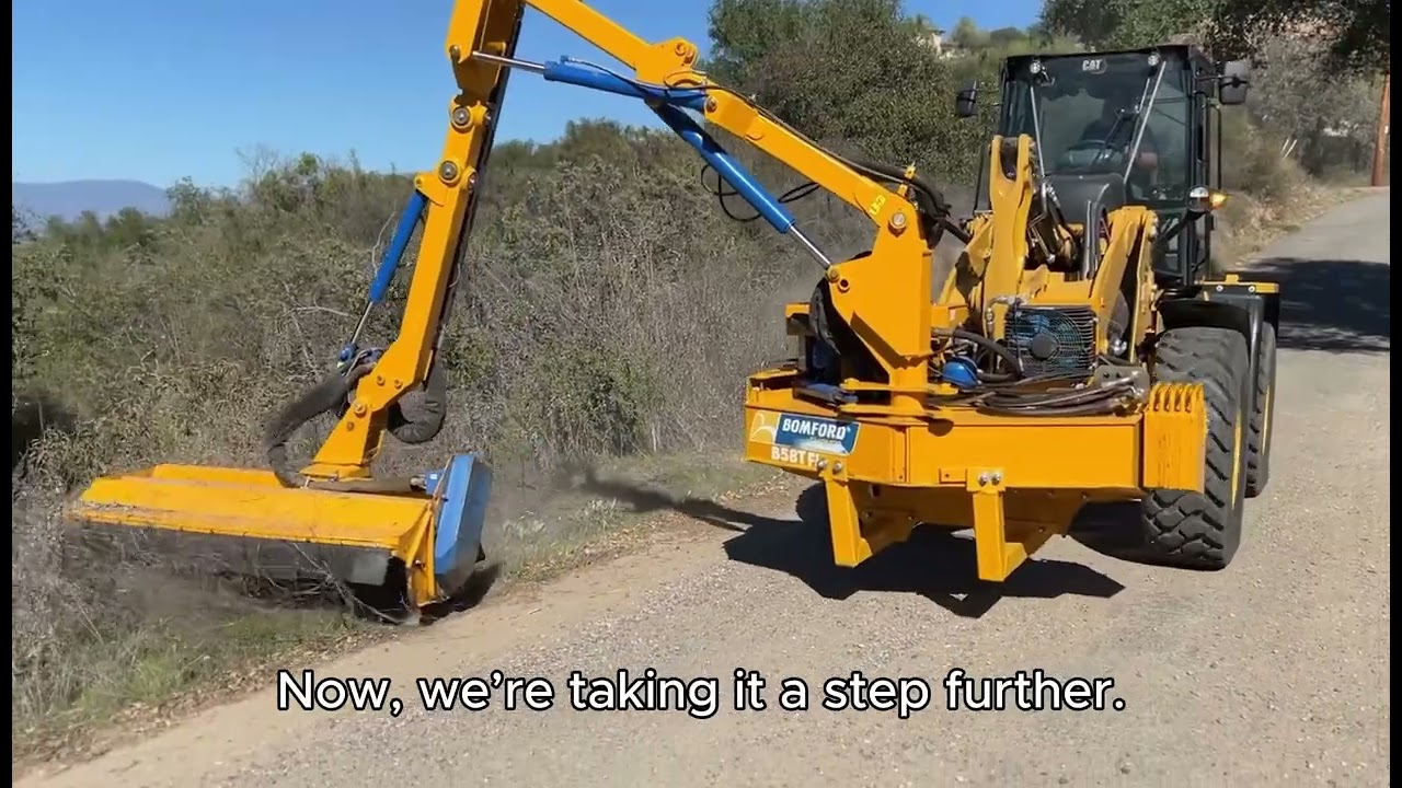 POWERLAND'S BOOM MOWERS