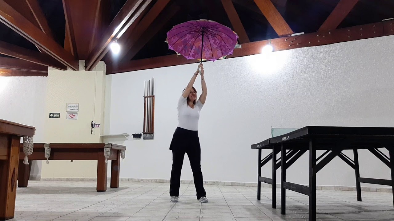 Coreografia com guarda Chuva Primavera, Pato Fu.