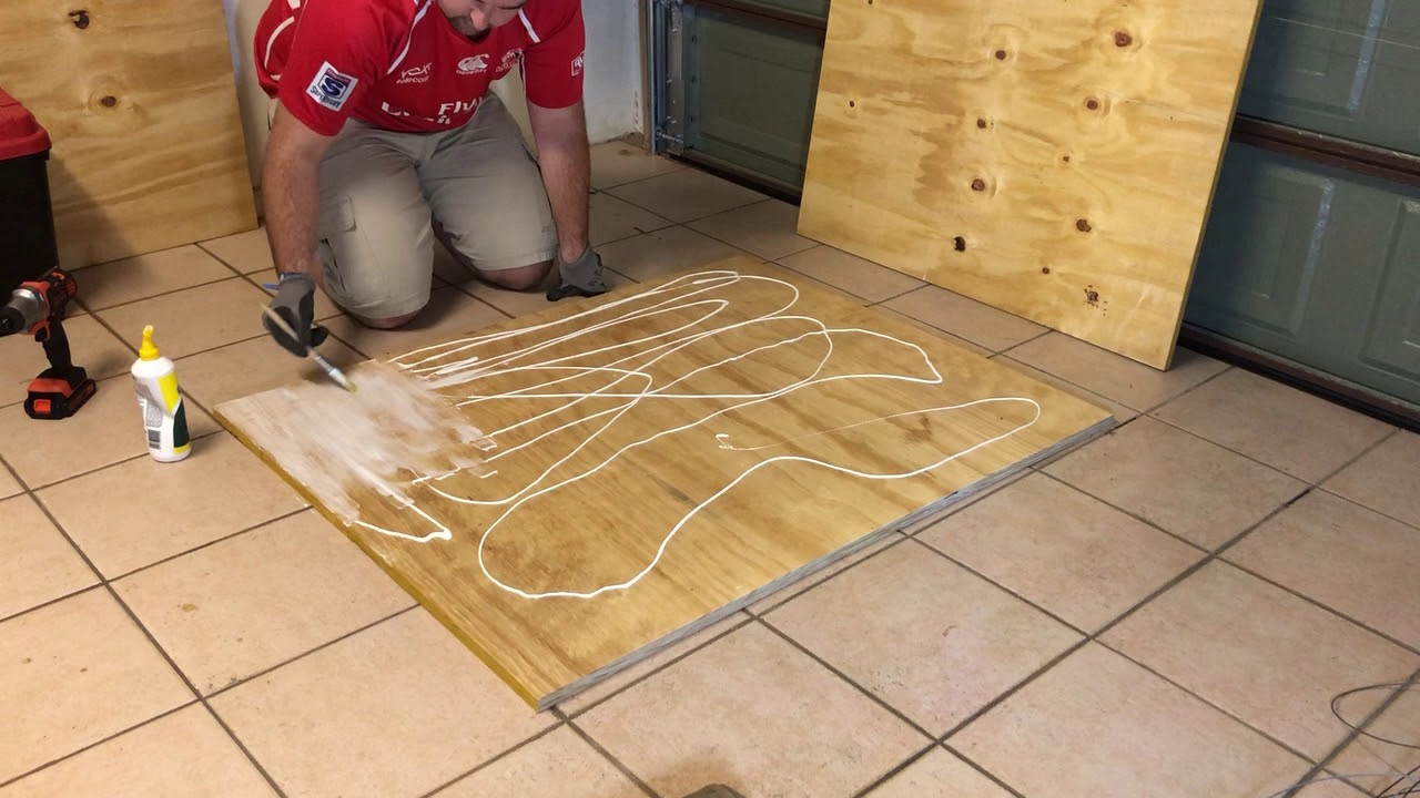 Laminating sheets of plywood to create a workbench top