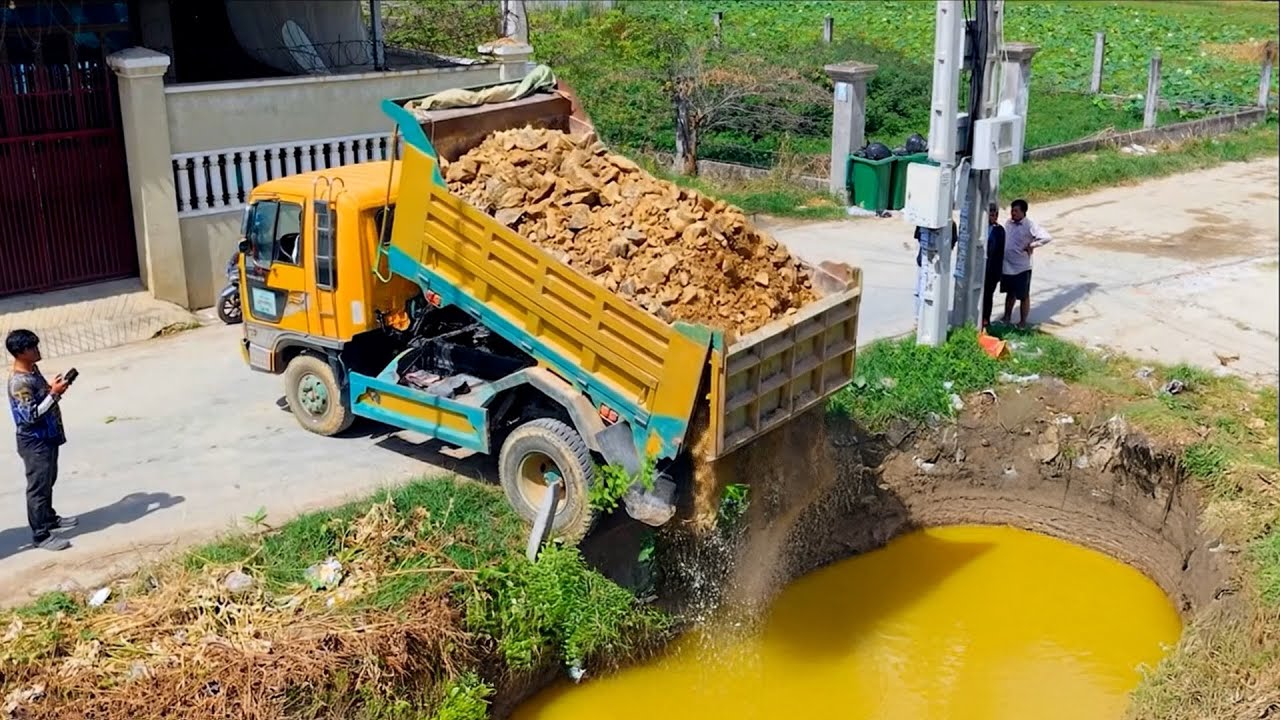 Bulldozer Power Completed Project Pour stones in action flooded land!!