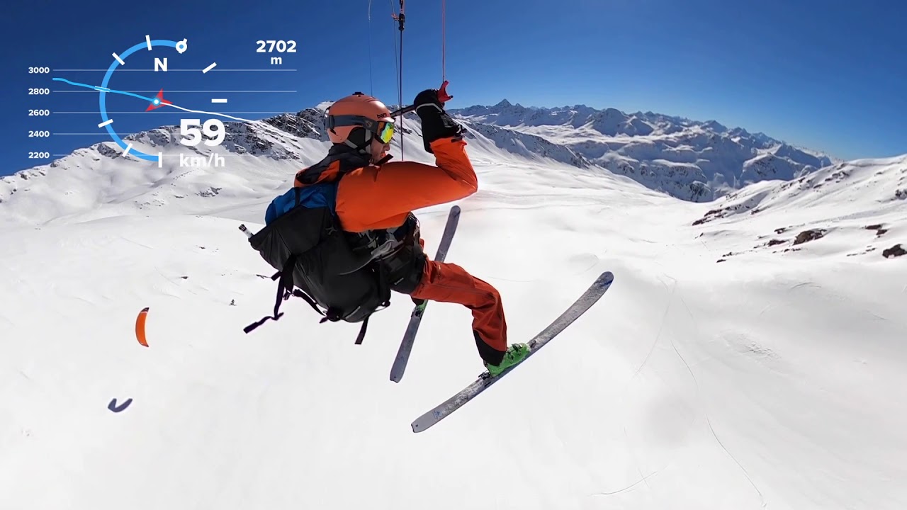 Rideup by kite on Pischahorn ( mountain )and Speedflying down by kite  / snowkiting
