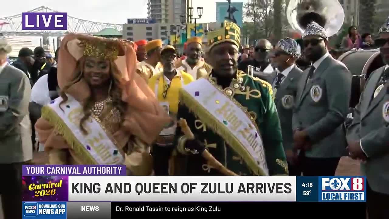 Zulu King and Queen make their Lundi Gras arrival at the shore of New Orleans' Woldenberg Park