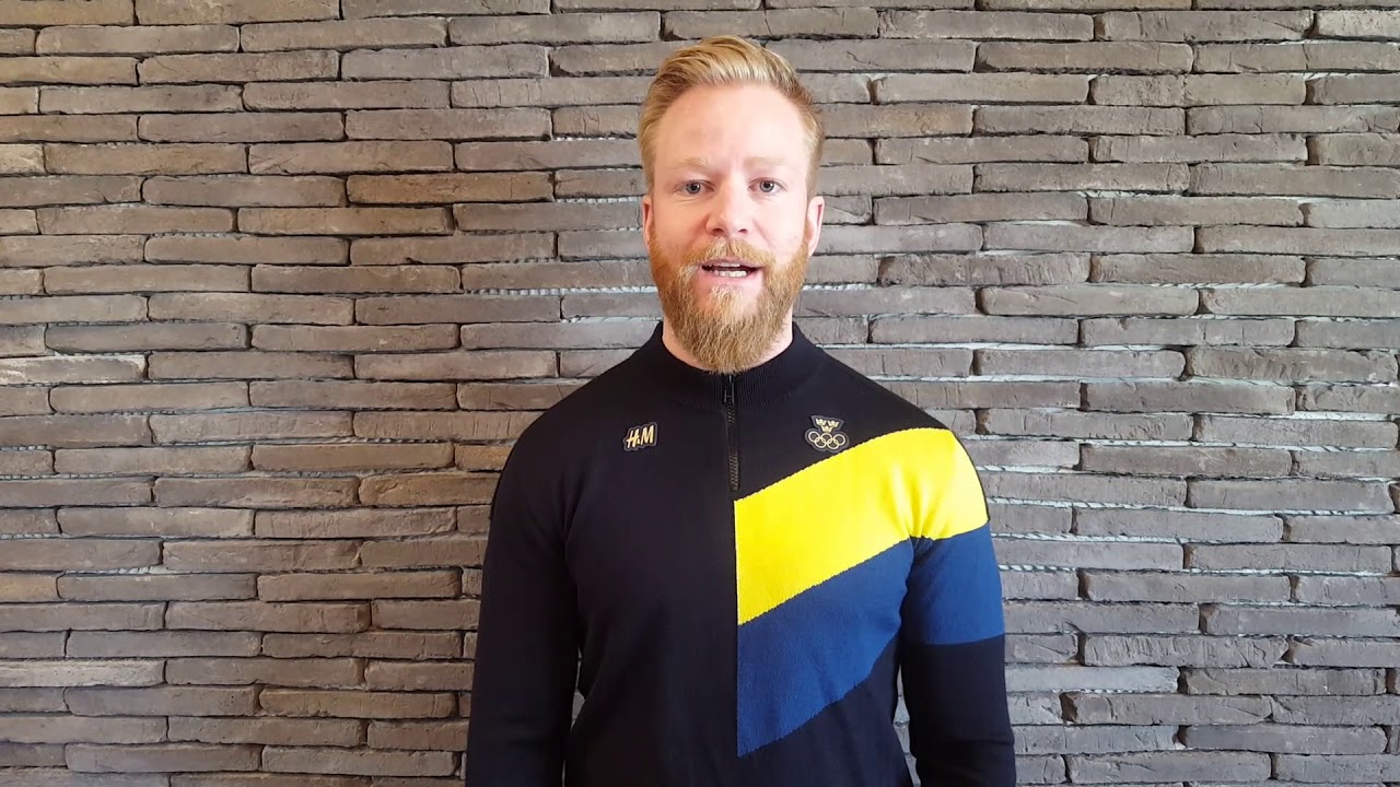 Niklas Edin bär den svenska fanan på OS-invigningen