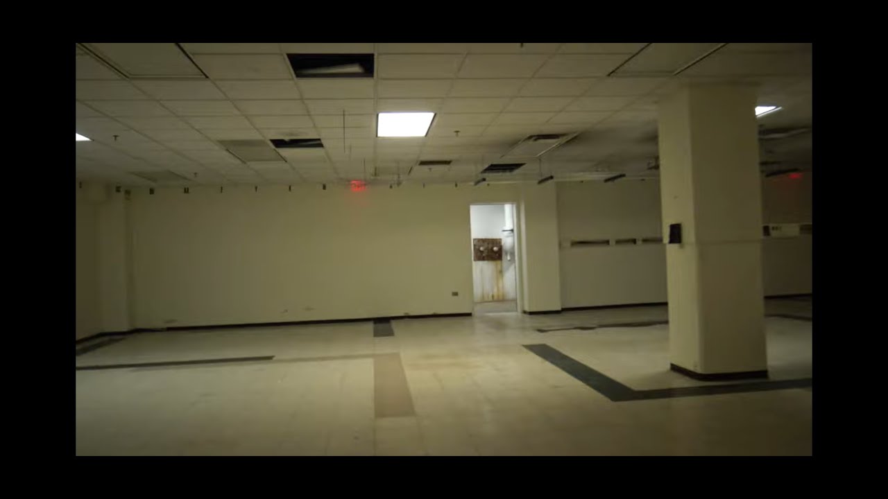 We found the real life backrooms: Getting lost in a massive abandoned office complex with power