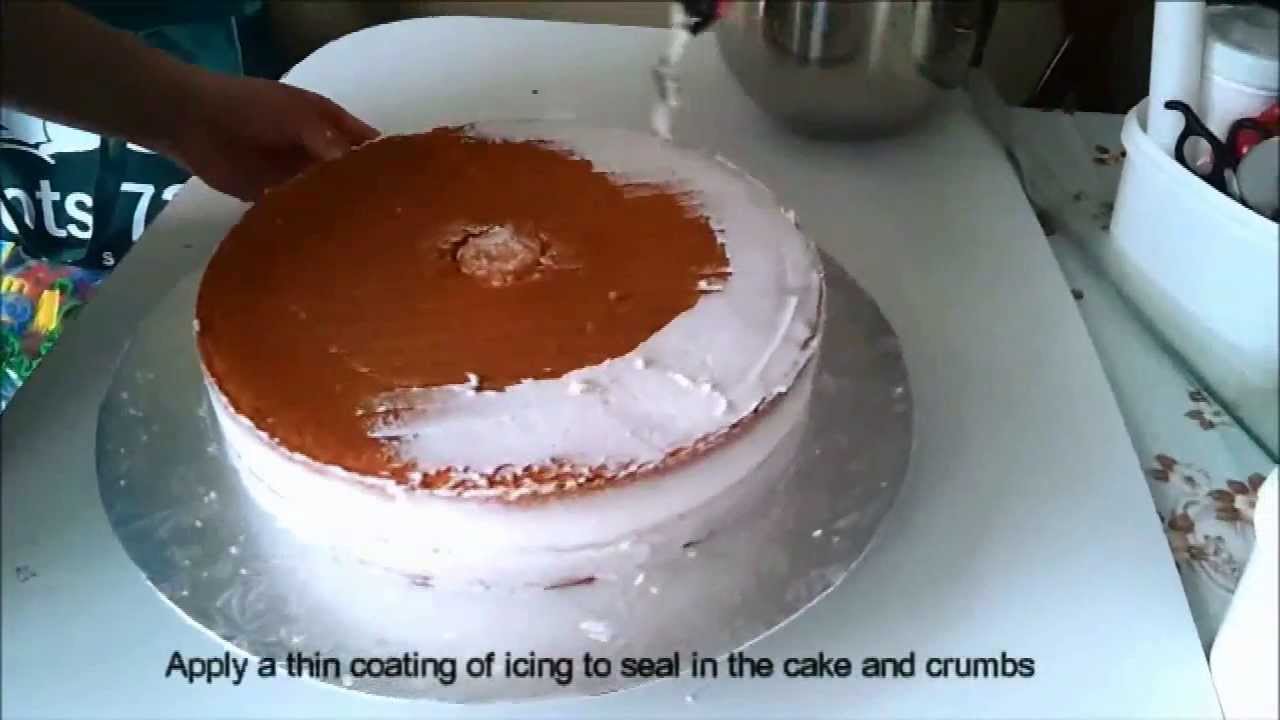 Quick tutorial on how to crumb coat or dirty ice a cake