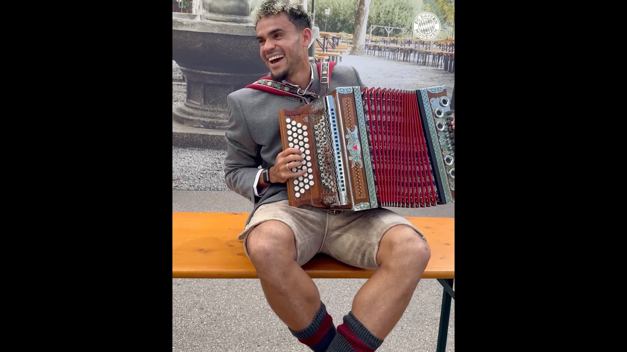 Luis D&iacute;az playing accordion during Bayern x Paulaner official photoshoot event!