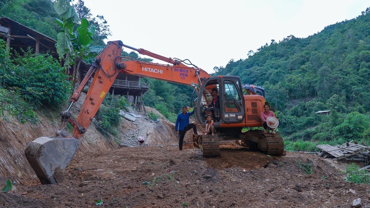 Excavator Re-excavating Farm, Leveling Barn Floor | Family Farm