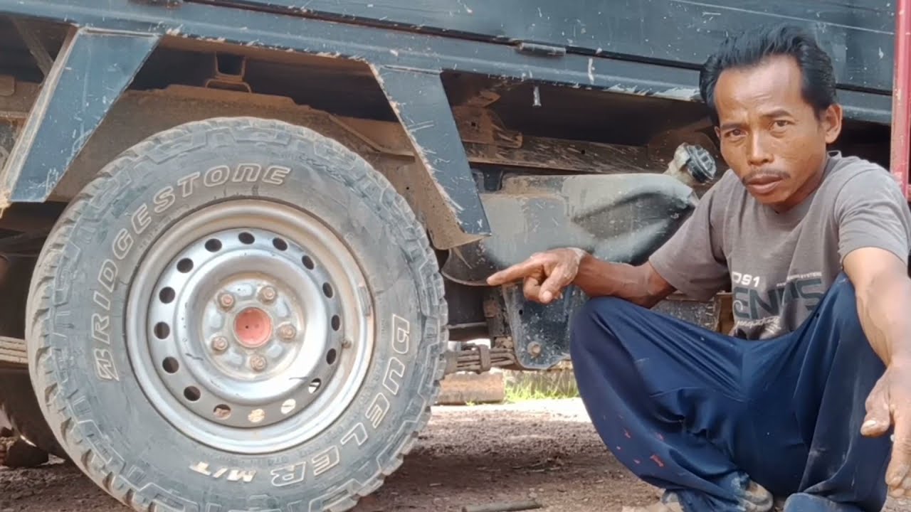 Cara melepas roda mobil Mega ceri yang lengket