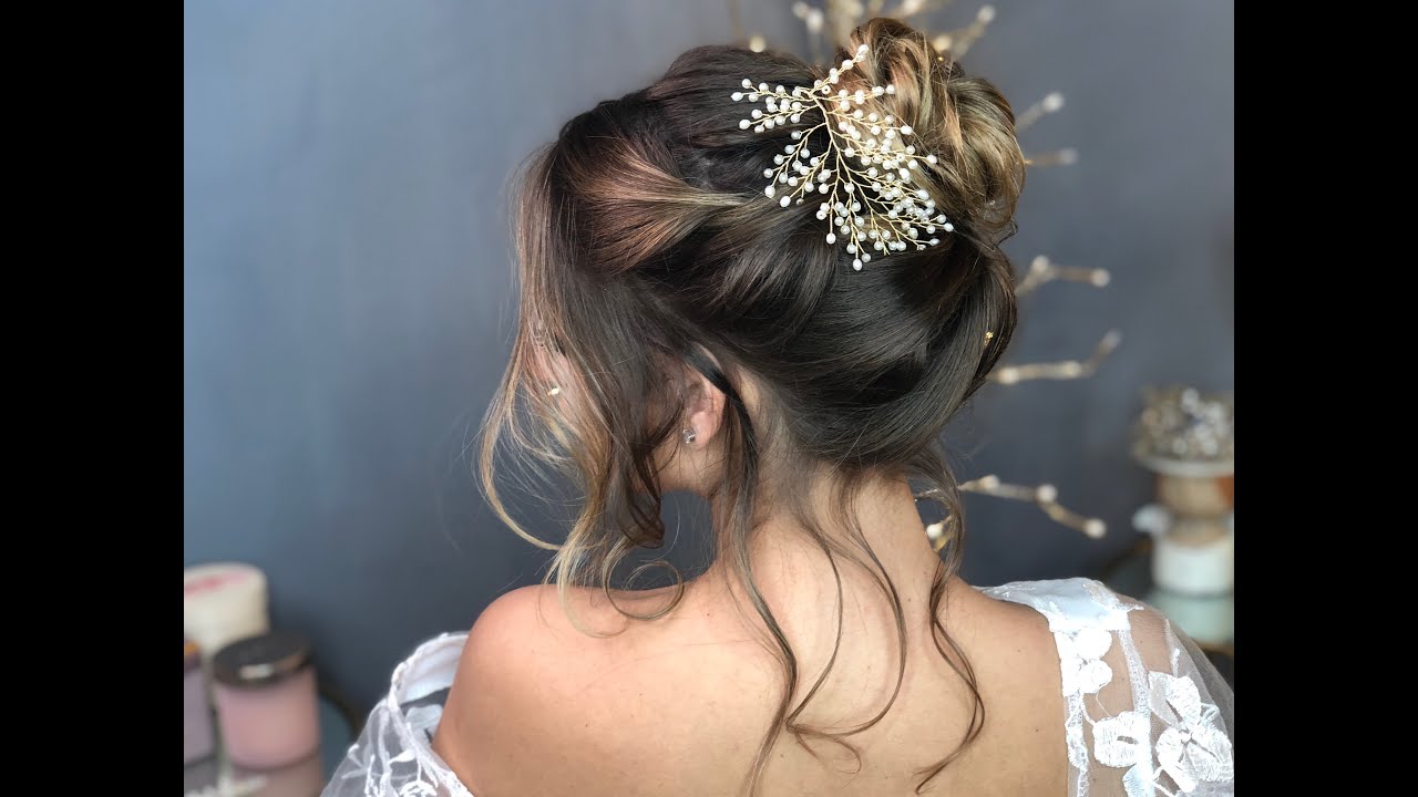 Acconciatura raccolta morbida, da sposa