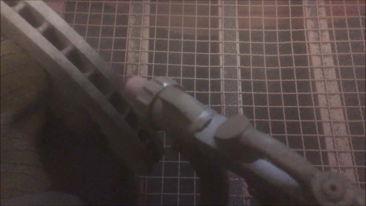 Sandblasting rusted brake disk