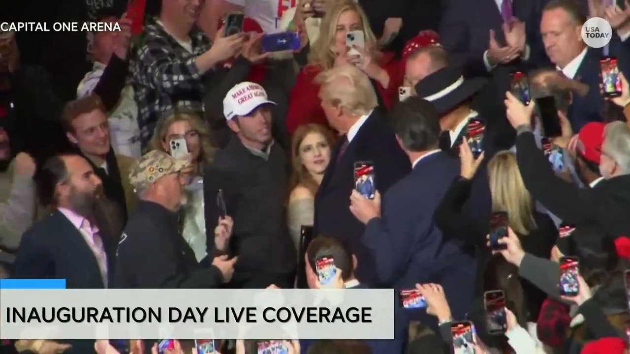 Donald Trump shakes hands with supporters at inauguration parade hours after becoming 47th president