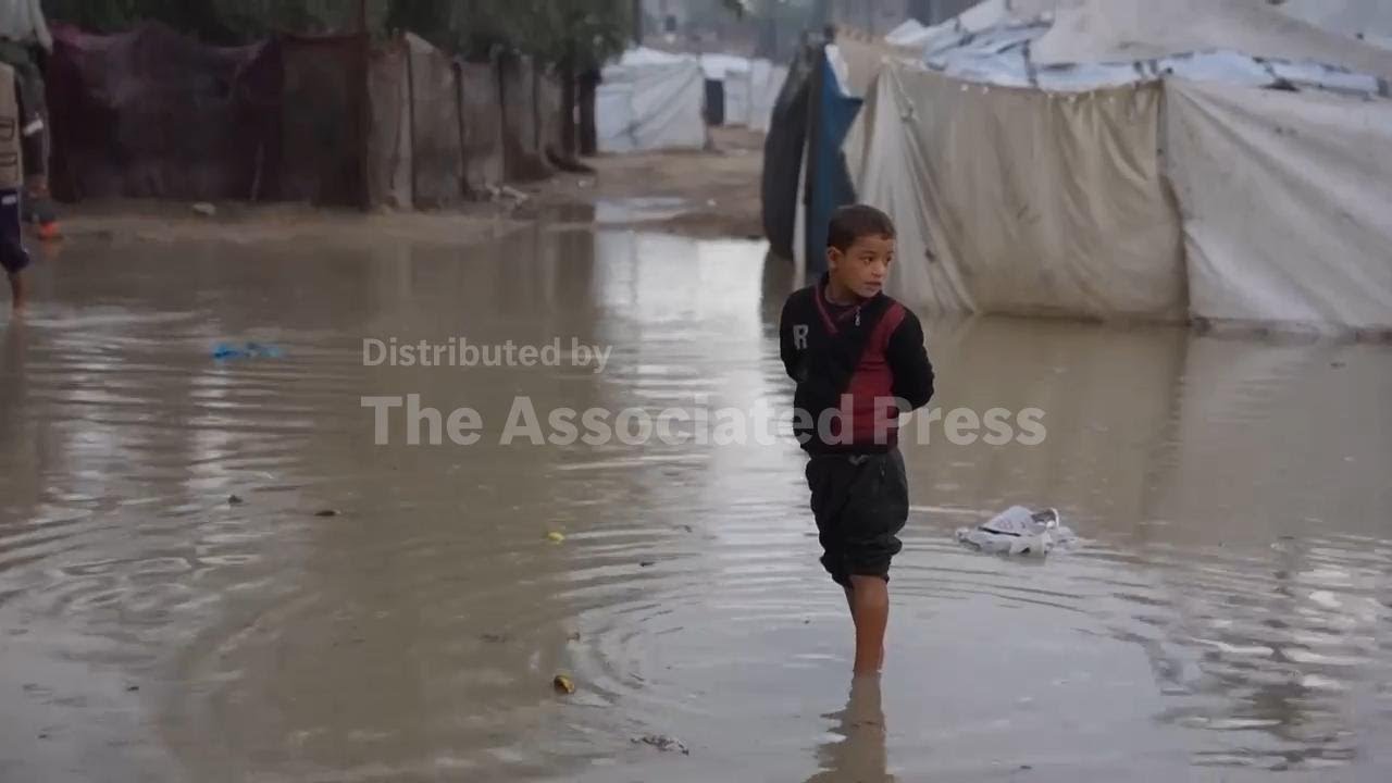 Rain drenches tent camps in central Gaza as winter storm continues in the war-battered enclave