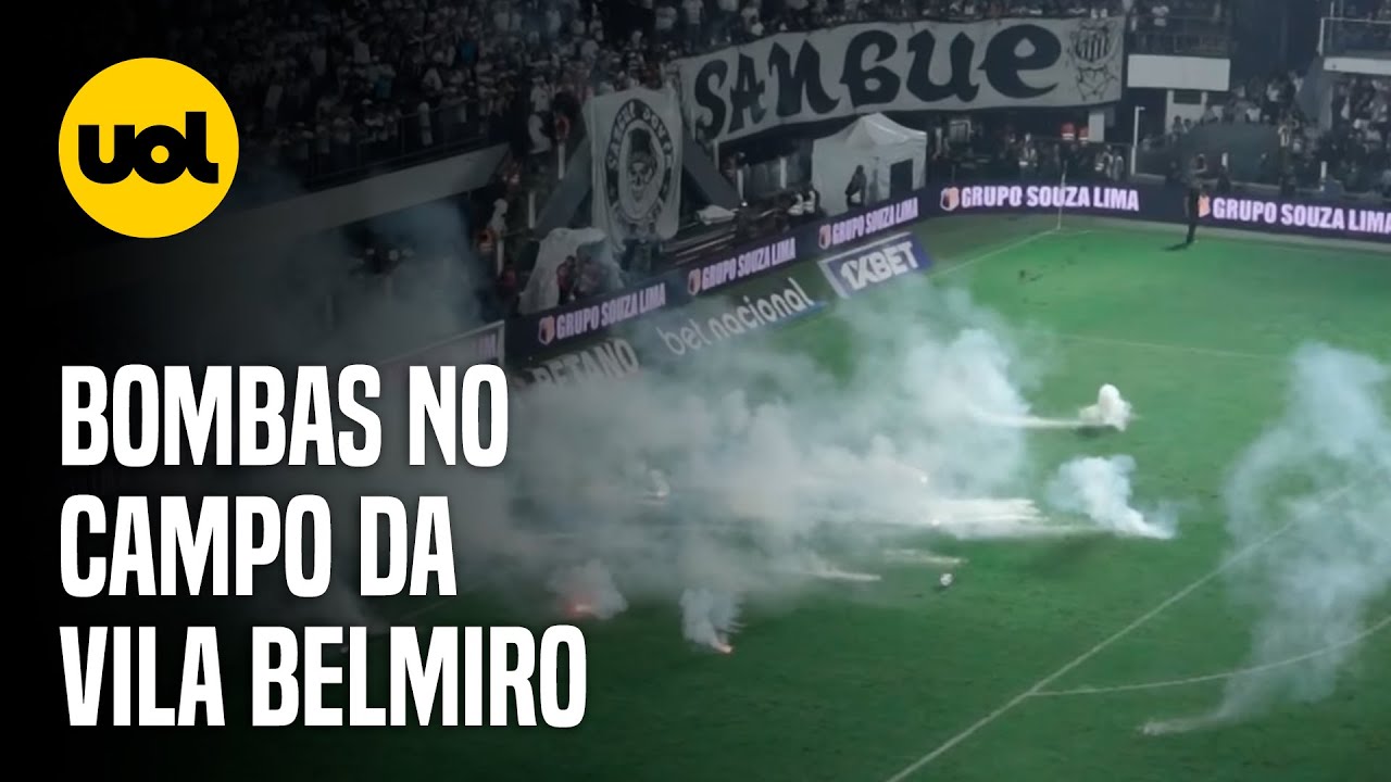 VEJA MOMENTO EM QUE TORCEDORES DO SANTOS ATIRAM BOMBAS NO CAMPO E ÁRBITRO ENCERRA CLÁSSICO