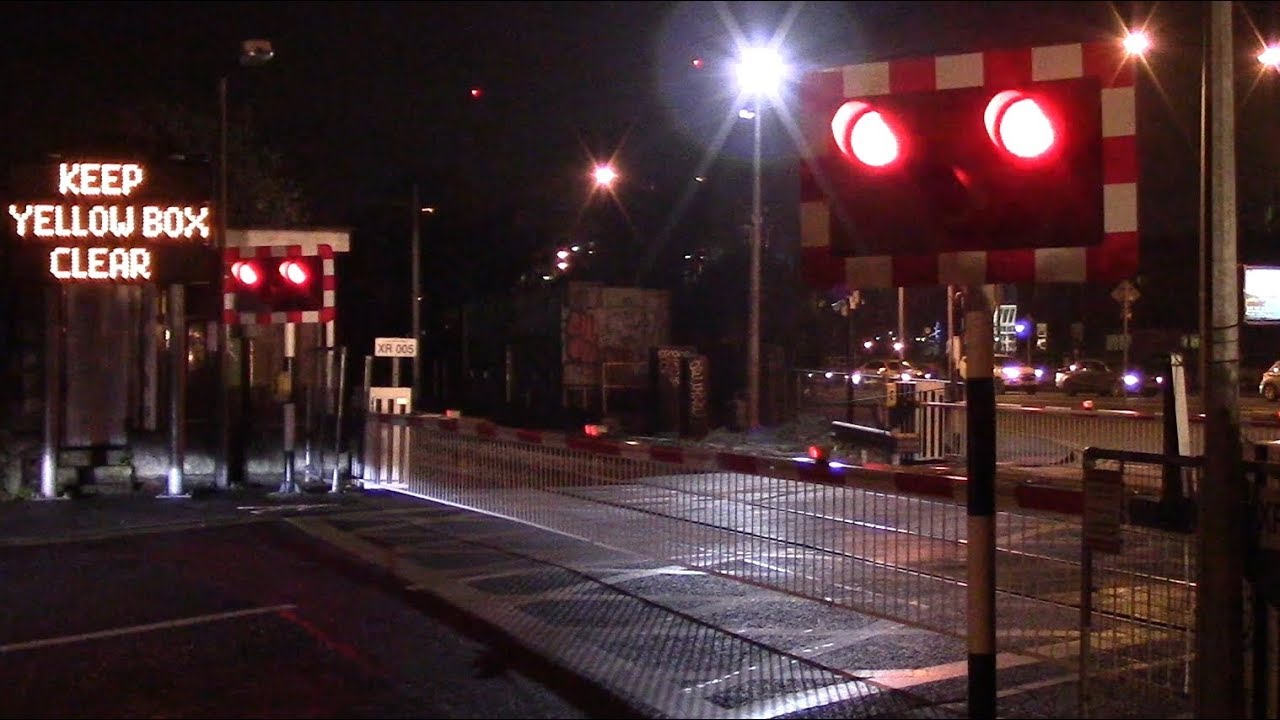 Merrion Gates Railway Crossing at Night - IE 8520 Class Dart Train