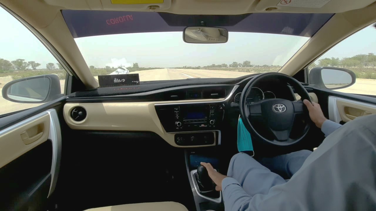 Toyota Corolla Gli 1.3 M/T (POV) Drive on an Airfield