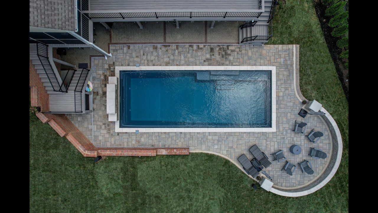 Installing a fiberglass pool and paver patio from start to finish (Derby City Pools)