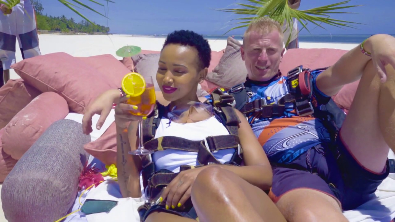 Huddah Monroe & Angelo - Tandem Skydive and landing on sunbed