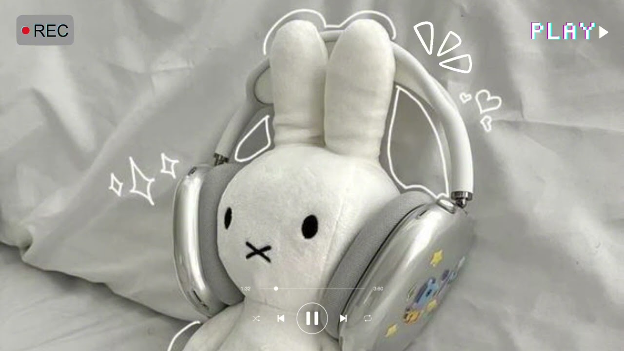 sitting back with a smile, letting the soft, happy tunes fill the air.