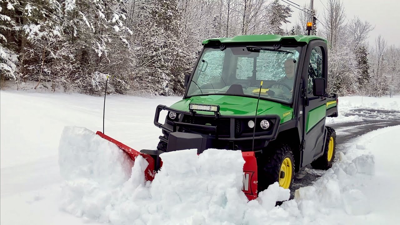 John Deere GATOR XUV 865R plowing snow with a WESTERN V-Plow. Late Winter Maine snow [Part 1 of 2]