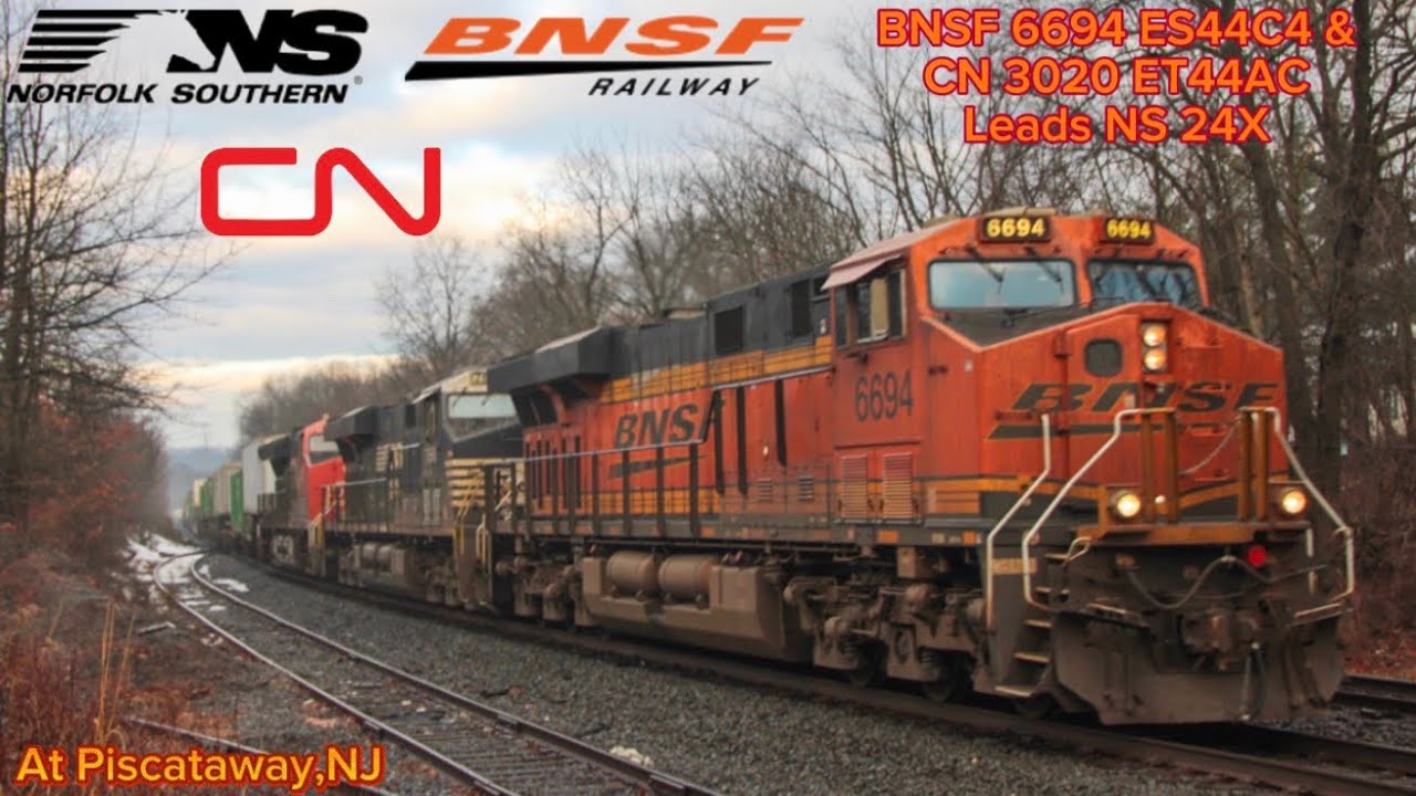 (FOREIGN POWER LEADING) BNSF 6694 ES44C4 leads NS 24X with CN 3020 ET44AC trailing at Piscataway,NJ!
