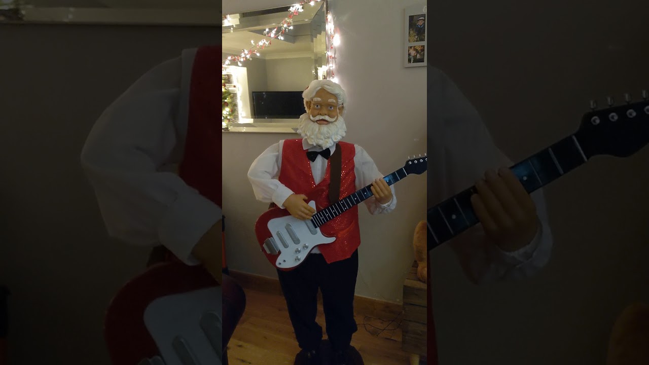 Gemmy 5ft Life Size Rocking Santa with guitar