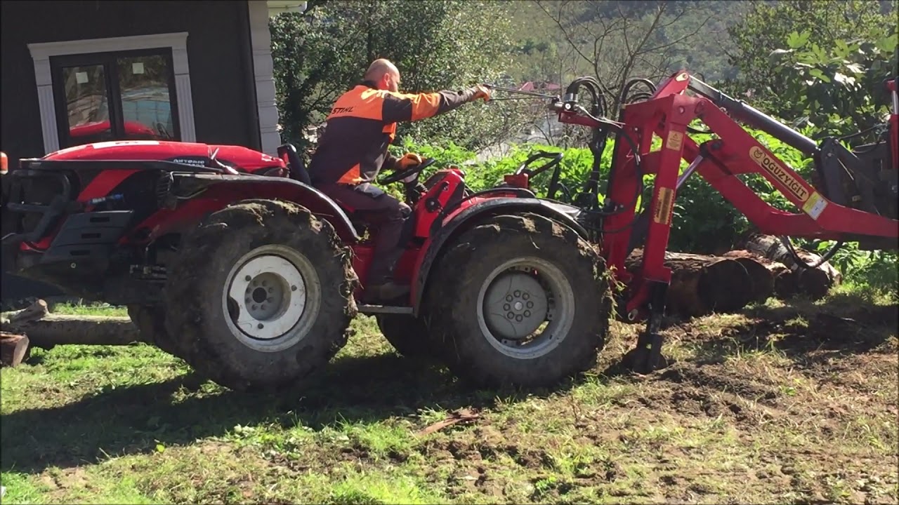 Antonio Carraro Trx 9900 Removing Trees from the Garden and Loading Iveco Daily with Assistant Scoop
