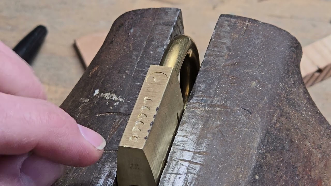 Destructively gutting an unguttable padlock - Abus Nautic T84/50
